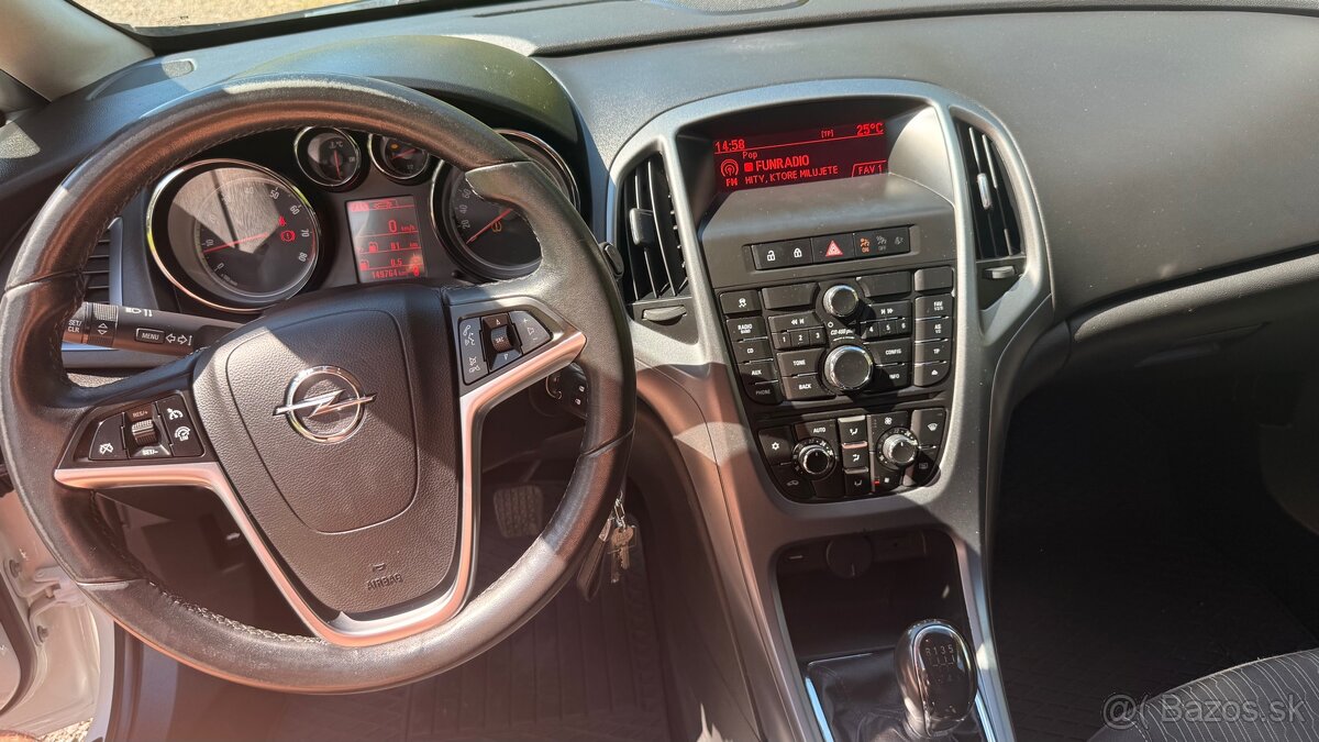 Opel astra j 1,4 74kw - 11