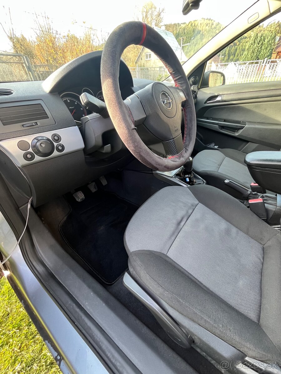 Opel astra h 1.9 cdti - 11