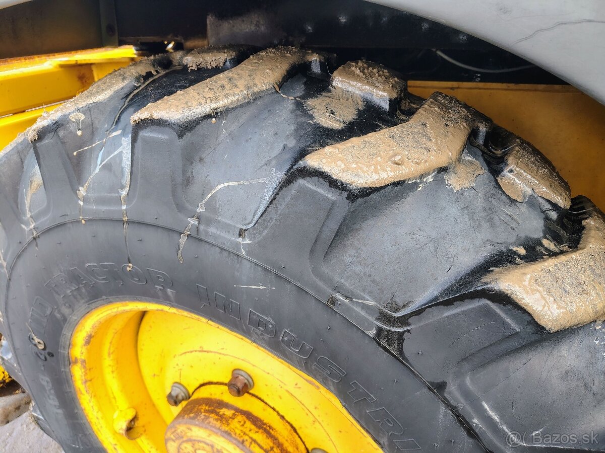 Rýpadlonakladač Komatsu WB97S - 11