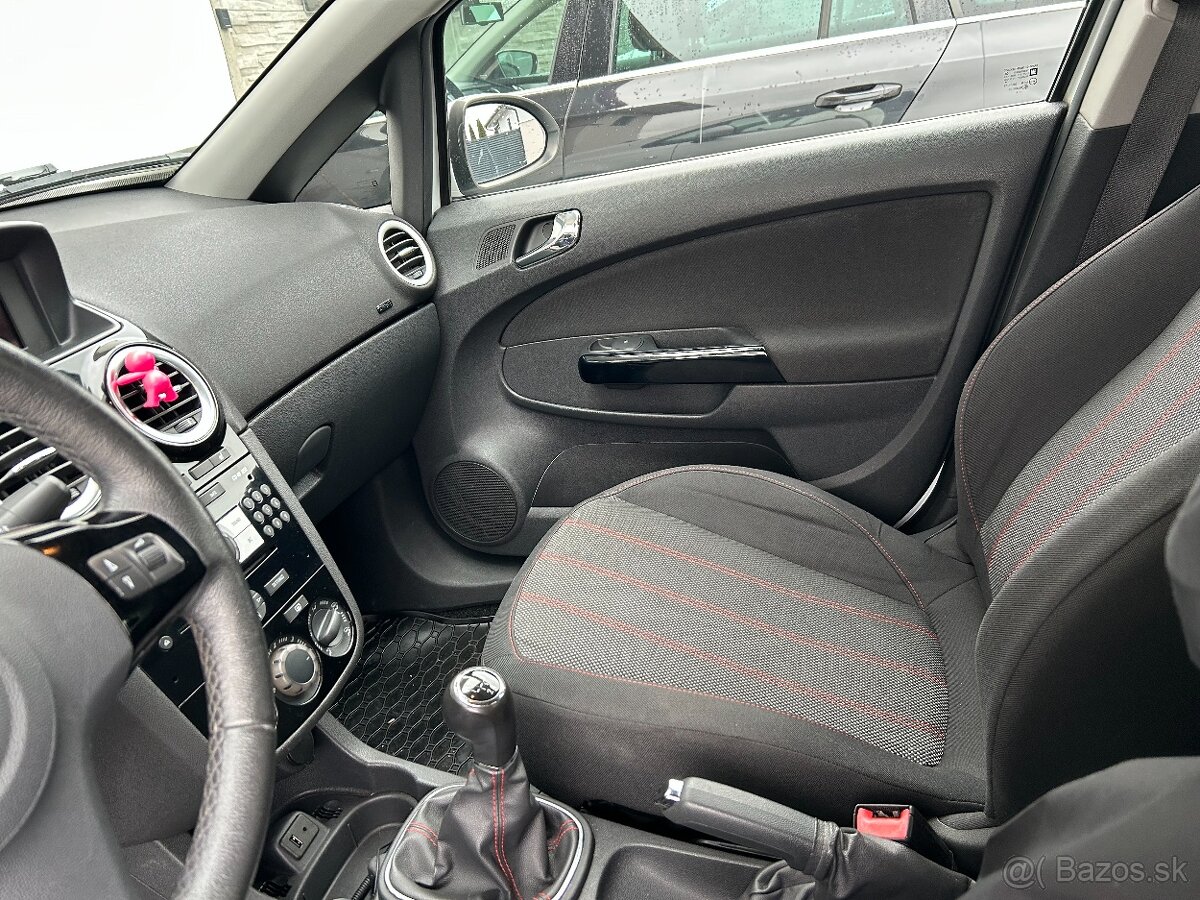 Opel Corsa D 1.2 - 11