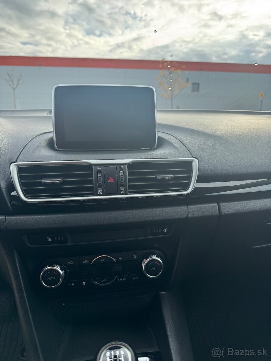 Mazda 3 1.5i (74kW) - 11