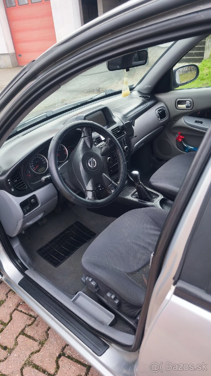 Nissan Almera 1.5 dci - 11