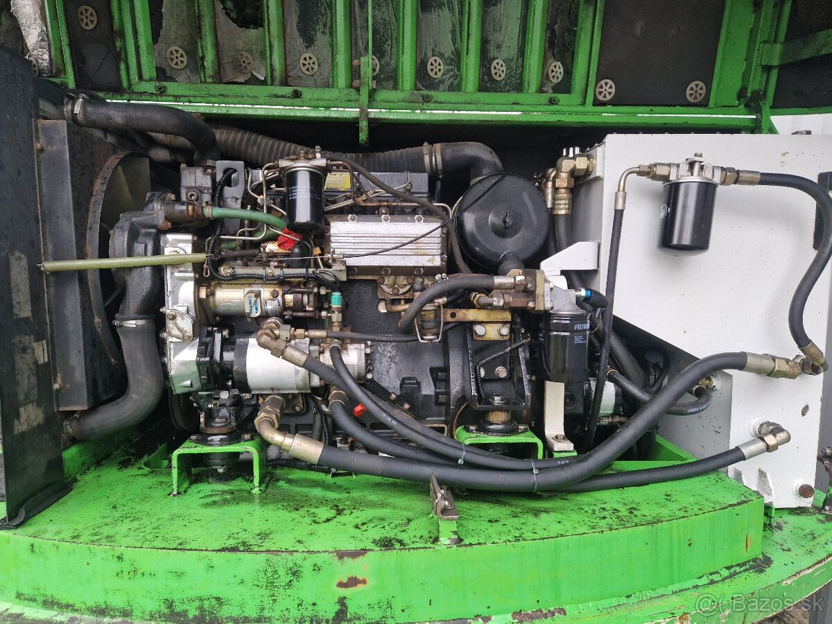 Kolesový bager O&K MH 2.10C 10t - 11