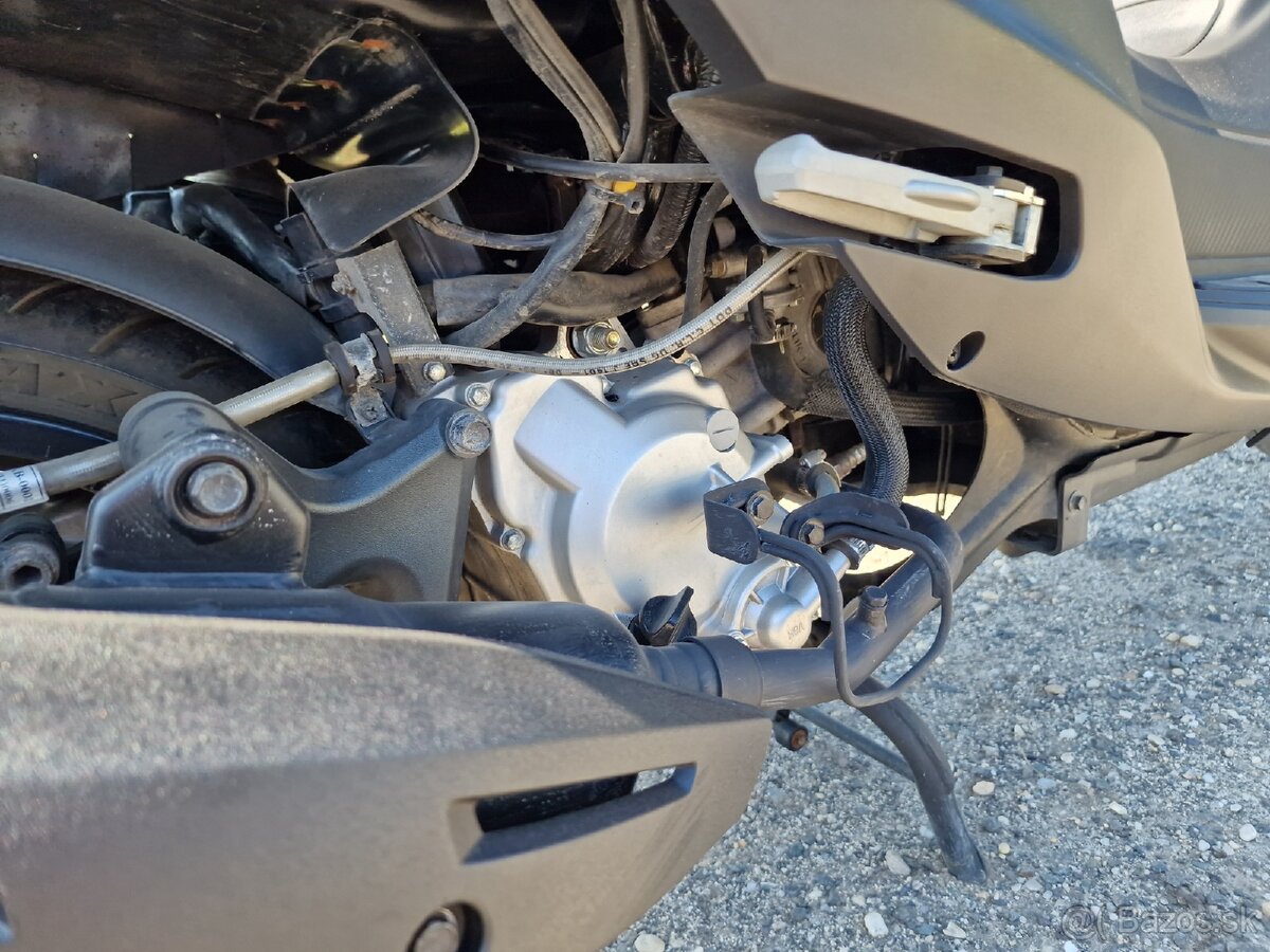 Sym Joymax Z 125 - 11