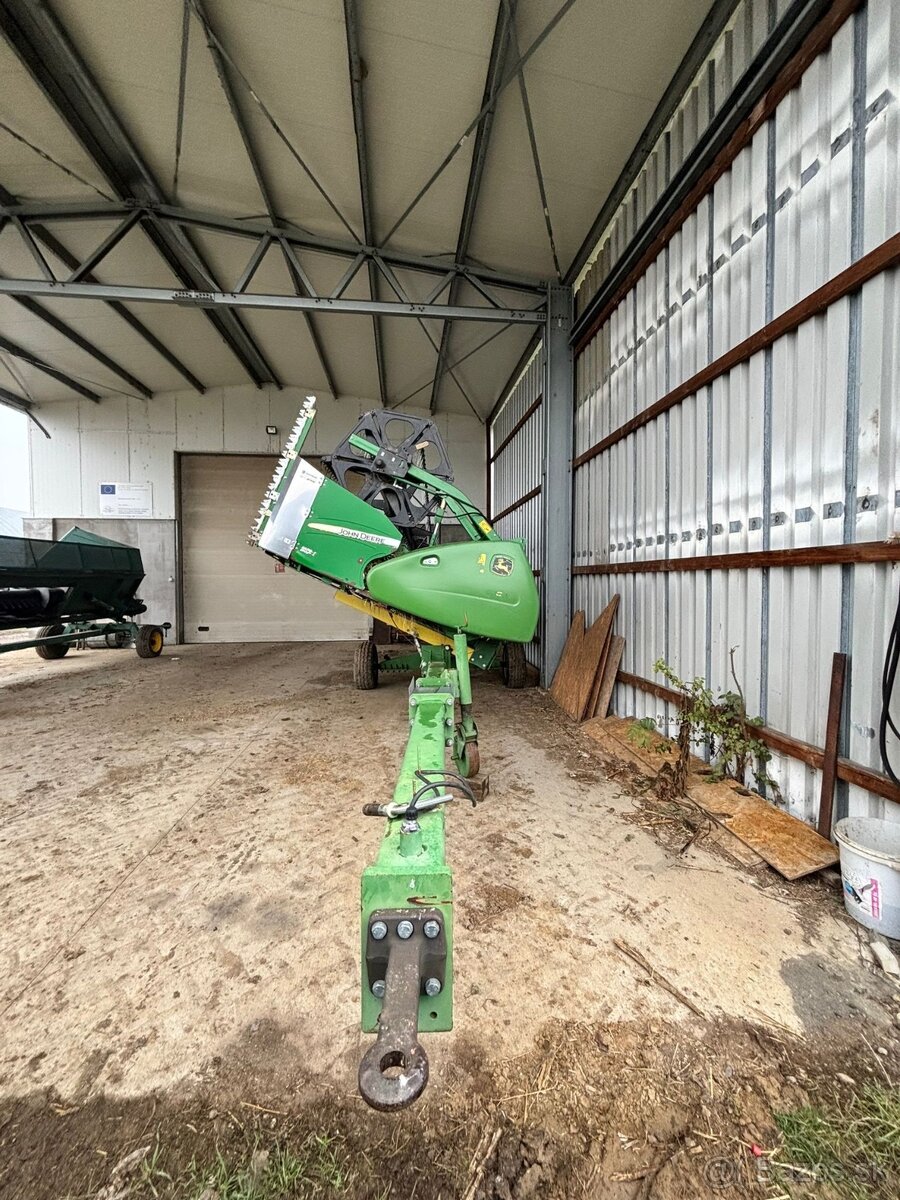 John Deere W550 - 11