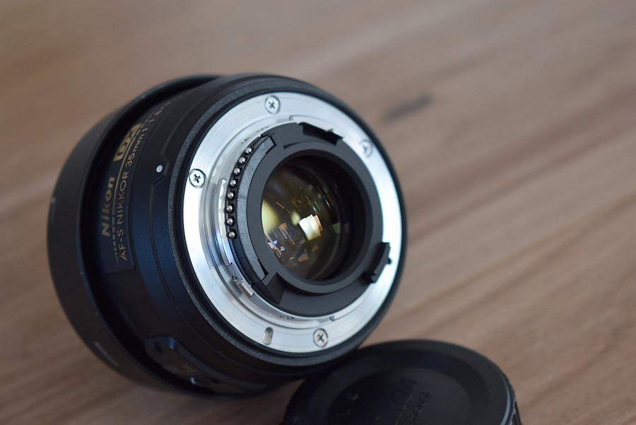 Nikkor 35 mm AF-s 1,8G nikon - clona krytky vrecko + filter - 11