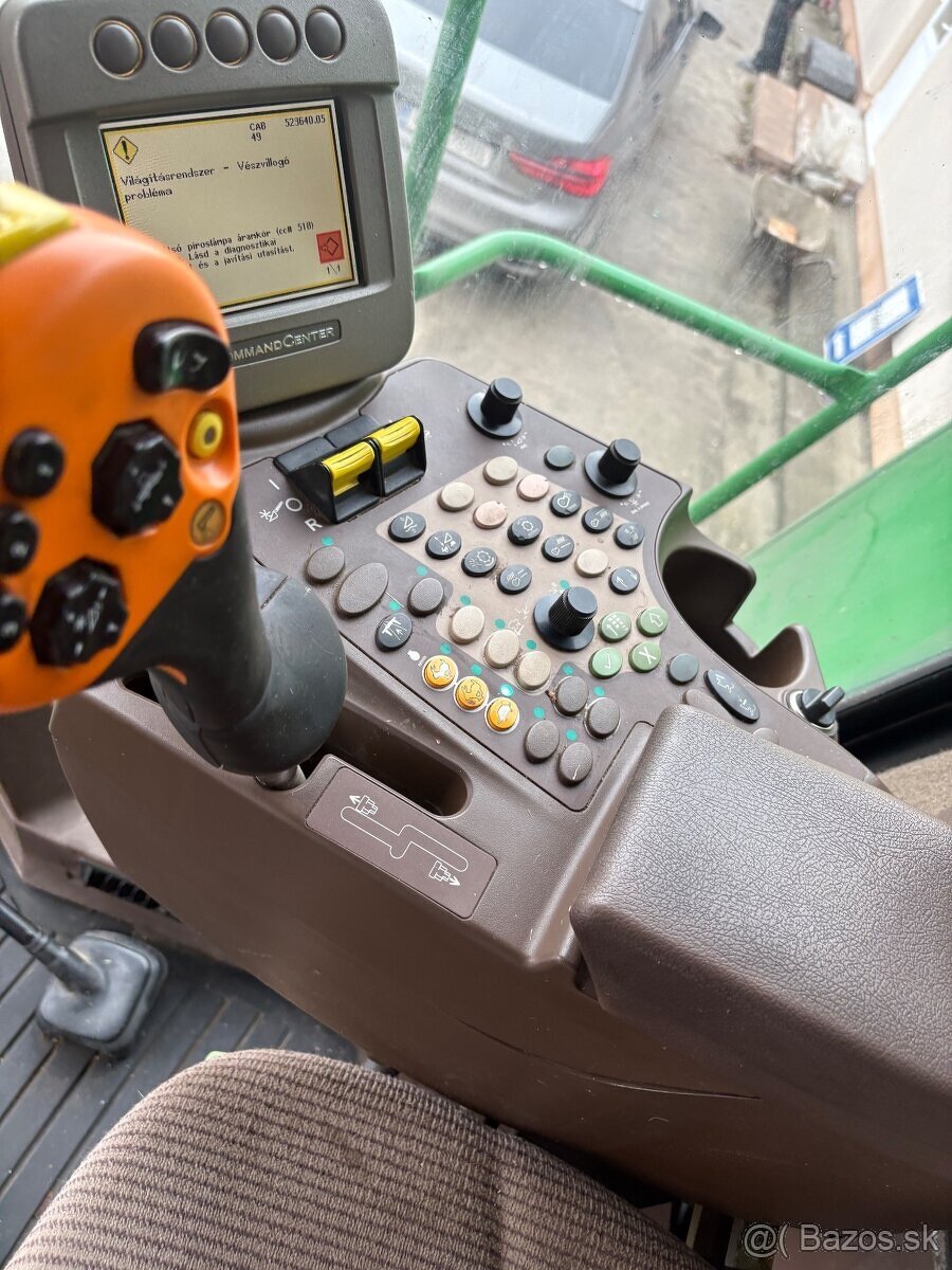 Predam kombajn John Deere W540 - 11