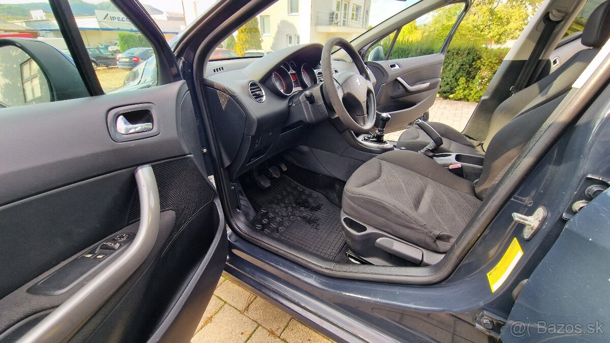 Peugeot 308 1.4i 16V - 11