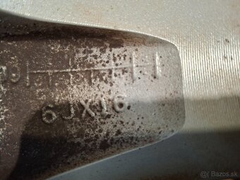 Orig. hlinikové disky Nissan Micra R16, 4x100 - 11