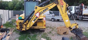 Traktorbager New Holland B110B - 11