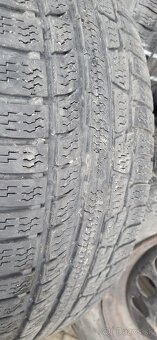 Plechové disky + zimné pneu + puklice Ford - 11