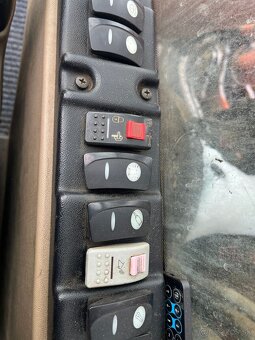 Kolesové rypadlo CASE WX145 - 11