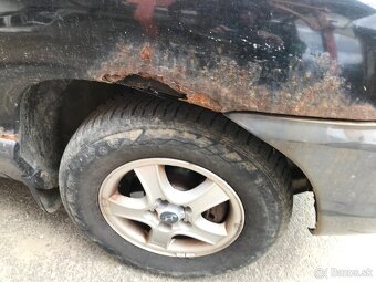 Santafe r. 2003, 80 kW 4x4 manual - 11
