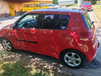 Suzuki Swift 1.3i - 11