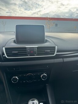 Mazda 3 1.5i (74kW) - 11
