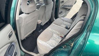 Nissan Almera N16 - 11