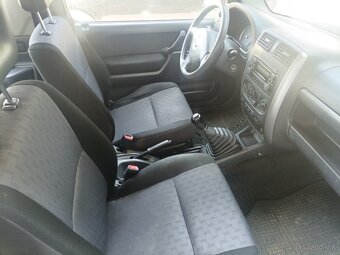 Suzuki Jimny 1.3i 4x4 - 11