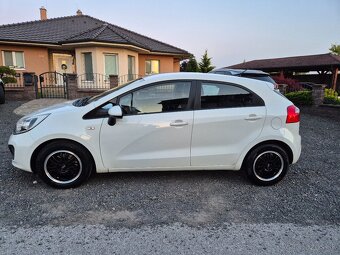Kia rio - 11
