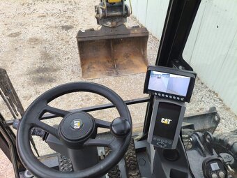 Kolový otočný bagr CAT M316 F - 11