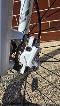 Karbon horský bicykel Kilimanjaro Shimano XT - 11