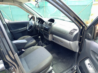 Suzuki Ignis 1,3 16v  VVT 69kw benzín ABS A/C Premium - 11