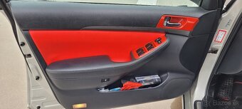 Toyota Avensis T25 hatchback - 11