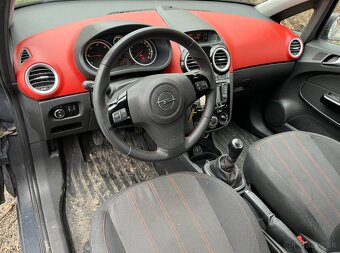 Opel Corsa D 1.3CDTi - 11