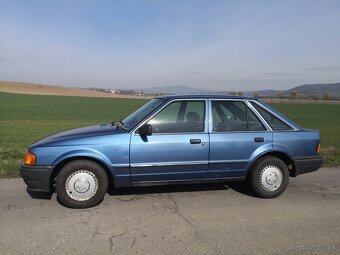 Ford Escort 1,4 GHIA 1987 - 11