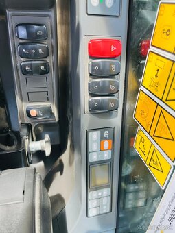 Kolesové rypadlo Caterpillar M316F - 11