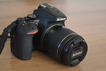 Nikon D5600 wifi BT - dotyk.dis. - VR objektiv AF-P 13tis.sn - 11