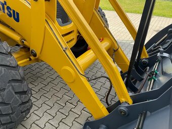 Komatsu WB97 2007 - 11