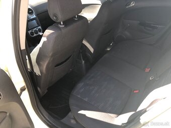 Opel Corsa D 1.4 16v - 11