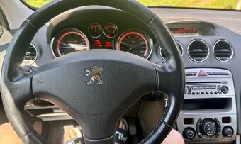 Peugeot 308 1.6E 131km panorama - 11
