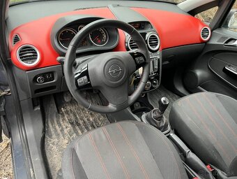 Opel Corsa D 1.3CDTi - 11