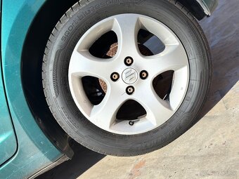 Suzuki Swift 1.3 - 11