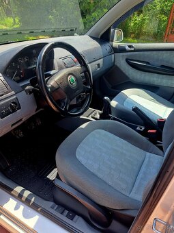 Škoda fabia 1.4 - 11