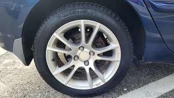 Toyota Corolla E12J rok 2004 - 11