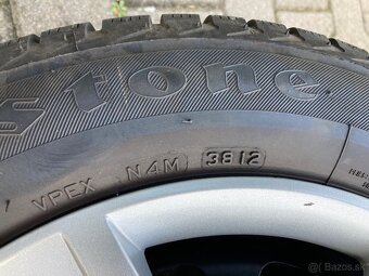 Predám sadu zimných kolies s puklicami na Ford Fiesta R14 - 11