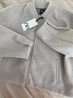 Zara bunda c. L - 11