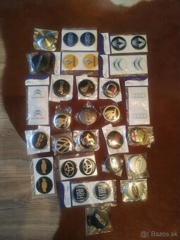 Puklice kryty kolies strieborne R14 a R16 a cervenostrieborn - 11