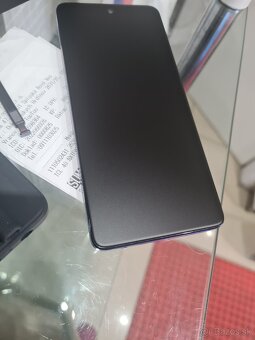 Mobilný telefón TCL 40NXT paper - 11