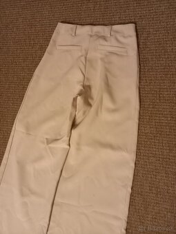 Dievčenské nohavice, rifle, elasťáky veľ. 146 - 7 ks - balík - 11