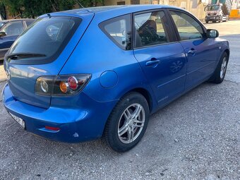 Mazda 3 1,6tdi výmena - 11