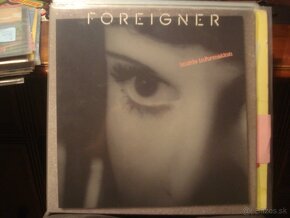 LP BOWIE COCKER B.HOLLY FOREIGNER ELO BYRDS E.JOHN MADONNA - 11