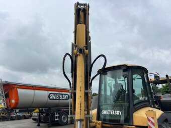 KOMATSU WB975 4X4 - 11