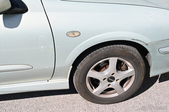Nissan Almera 1.8 benzín r.v. 2001 - 11