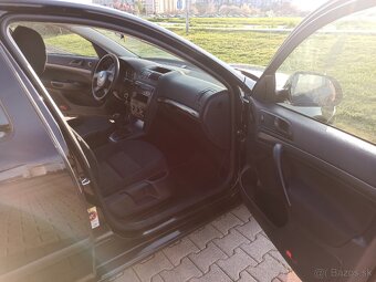 Škoda Octavia 1,6 benzín 2012 - 11