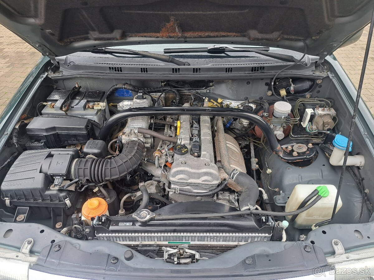 Suzuki Grand Vitara 2.0, benzin 94 kw, 4x4 - 12