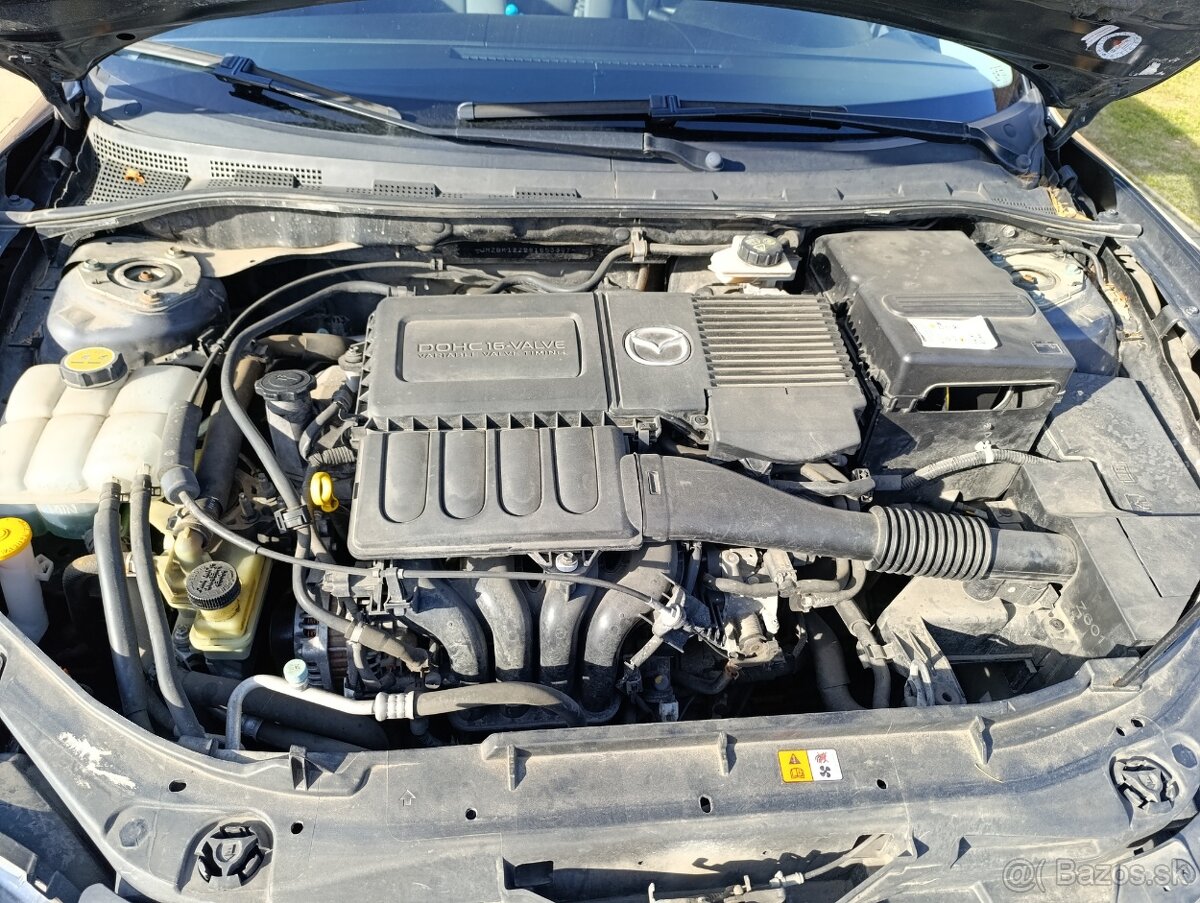 Mazda 3 sedan - 12