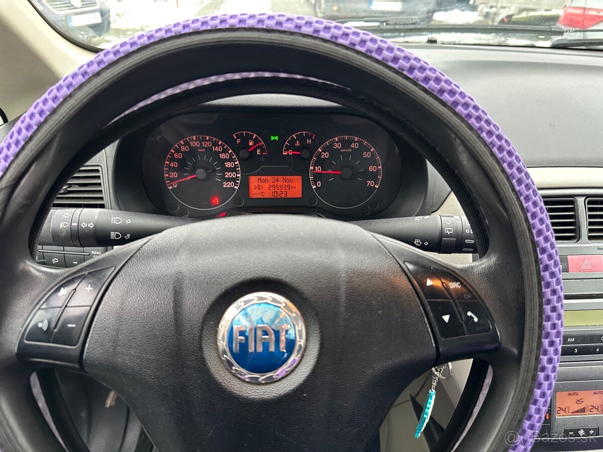 Fiat Punto 66kw a/C - 12